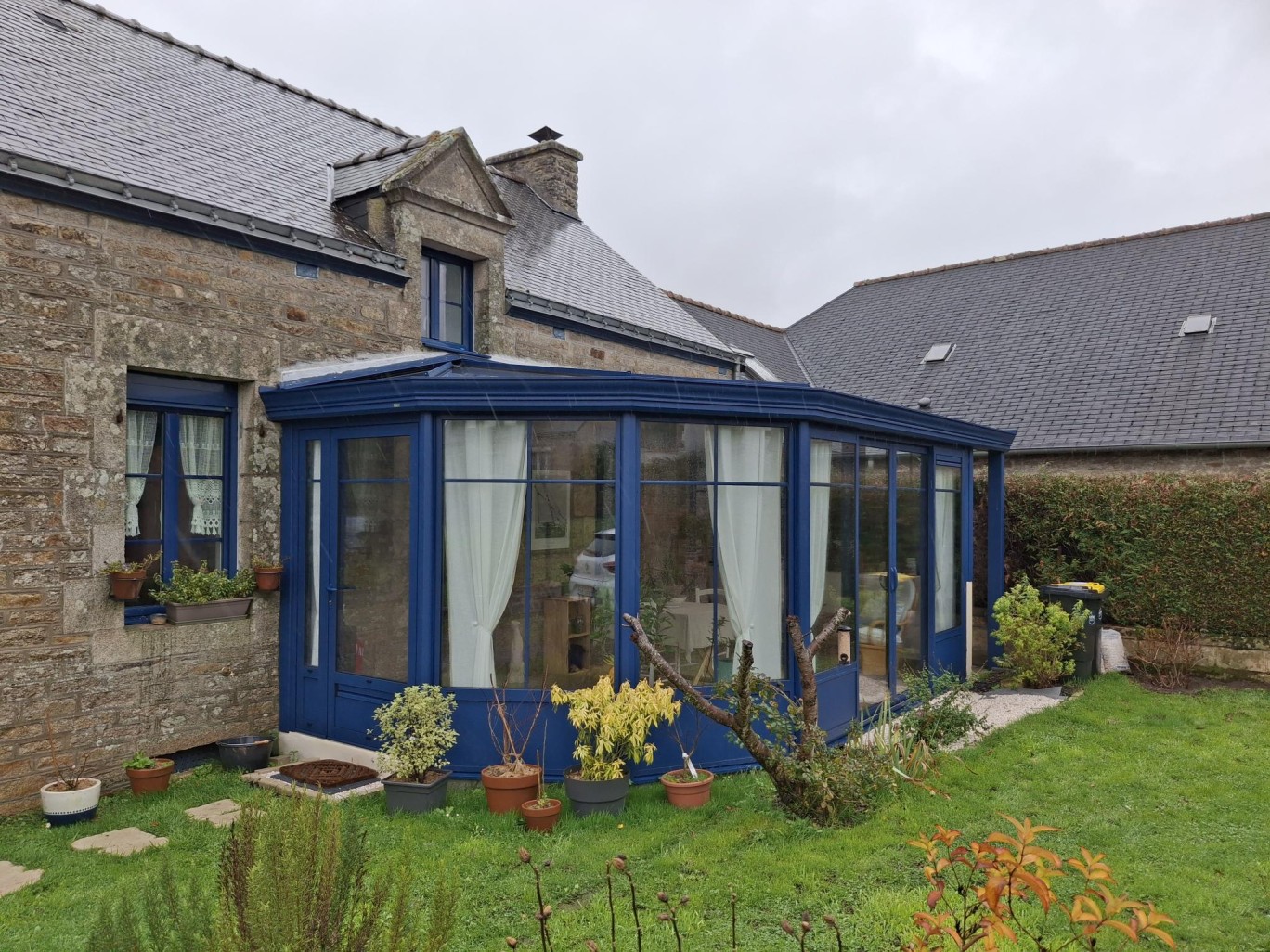 Véranda en aluminium à Cruguel